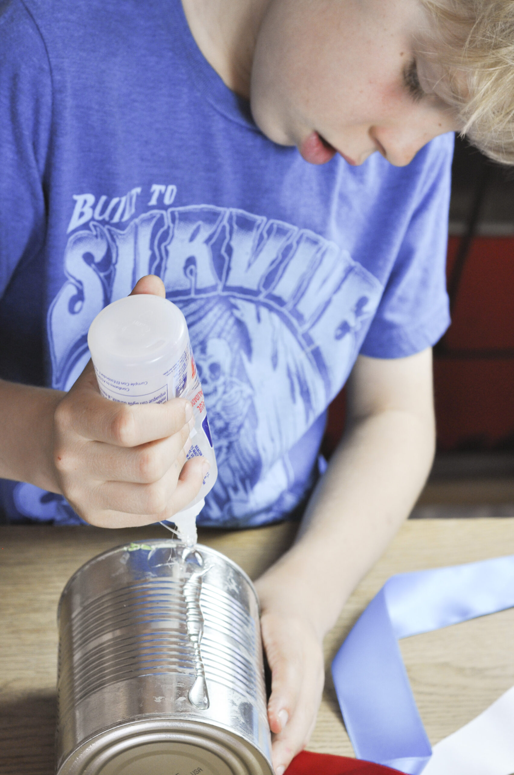 Makeshift make believe: Homemade toys - jam tin stilts, cotton