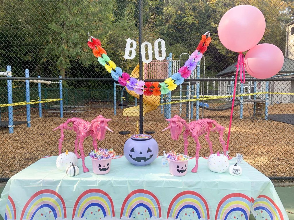 halloween community festival rainbow unicorn table