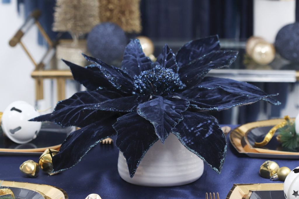 navy and gold holiday table setting centerpiece