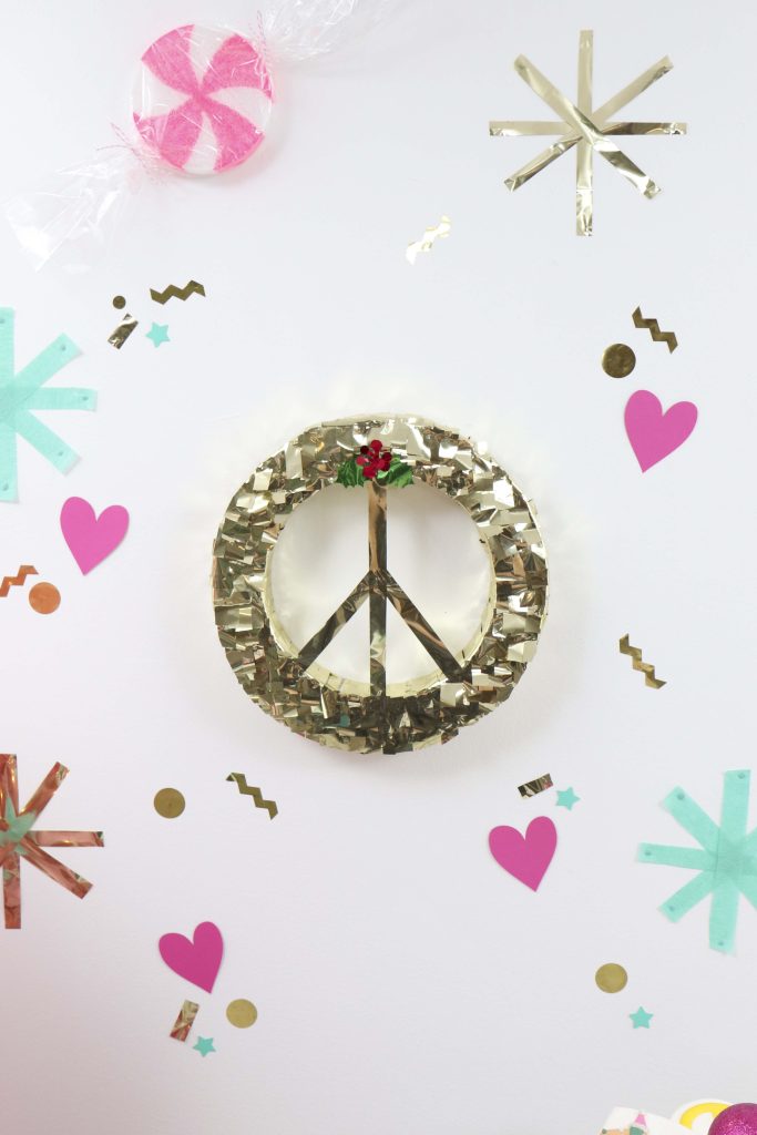 Making Spirits Bright Neon Holiday Party peace sign decor