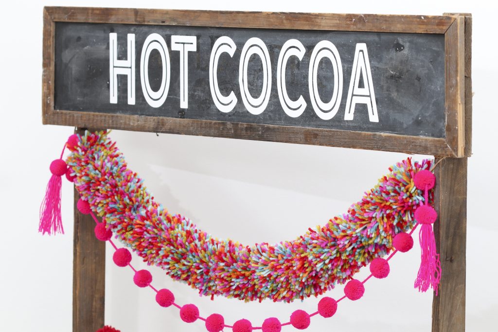 Pom Pom Party for the Holidays hot cocoa station chalkboard sign