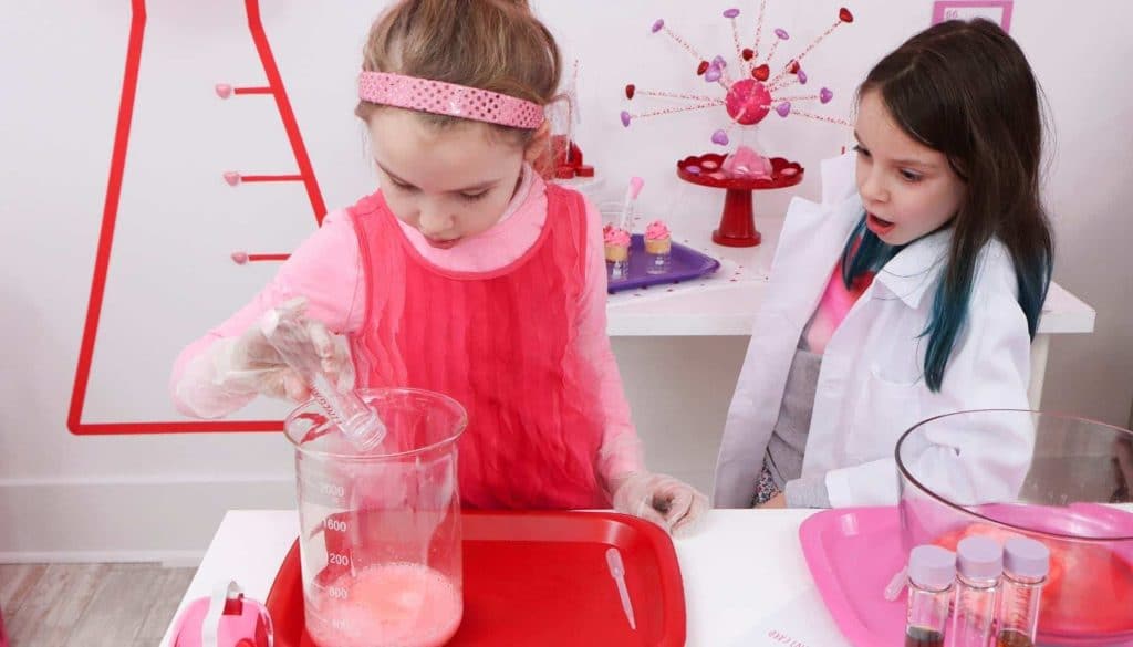 Create a "Laboratory of Love" for kids who love to learn this Valentine's Day! Get all of the details for a pink and red Valentine's Day Science Party for kids now at fernandmaple.com!