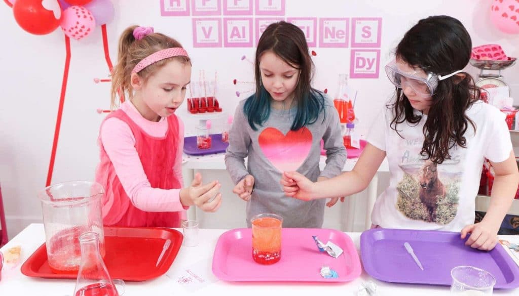 Create a "Laboratory of Love" for kids who love to learn this Valentine's Day! Get all of the details for a pink and red Valentine's Day Science Party for kids now at fernandmaple.com!