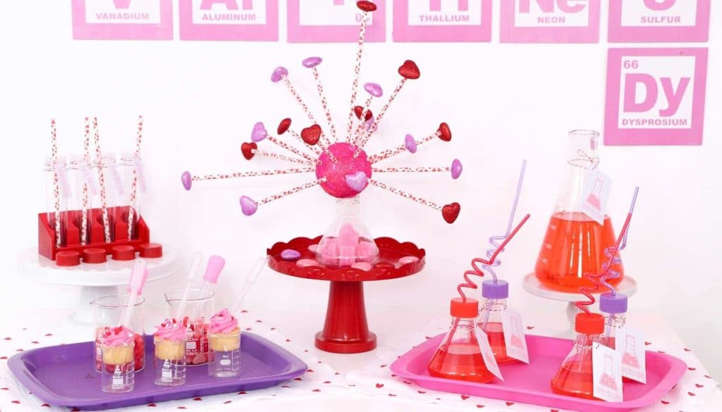 Create a "Laboratory of Love" dessert and drink table for kids who love to learn this Valentine's Day! Get all of the details for a pink and red Valentine's Day Science Party for kids now at fernandmaple.com!