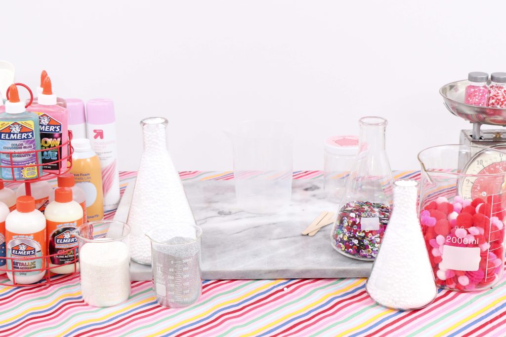 Set up a heart-filled Slime Lab for a fun and entertaining Valentine's Day Slime Party for Kids! Plus, how to create to-go Slime Kits for friends! Get details now at fernandmaple.com!