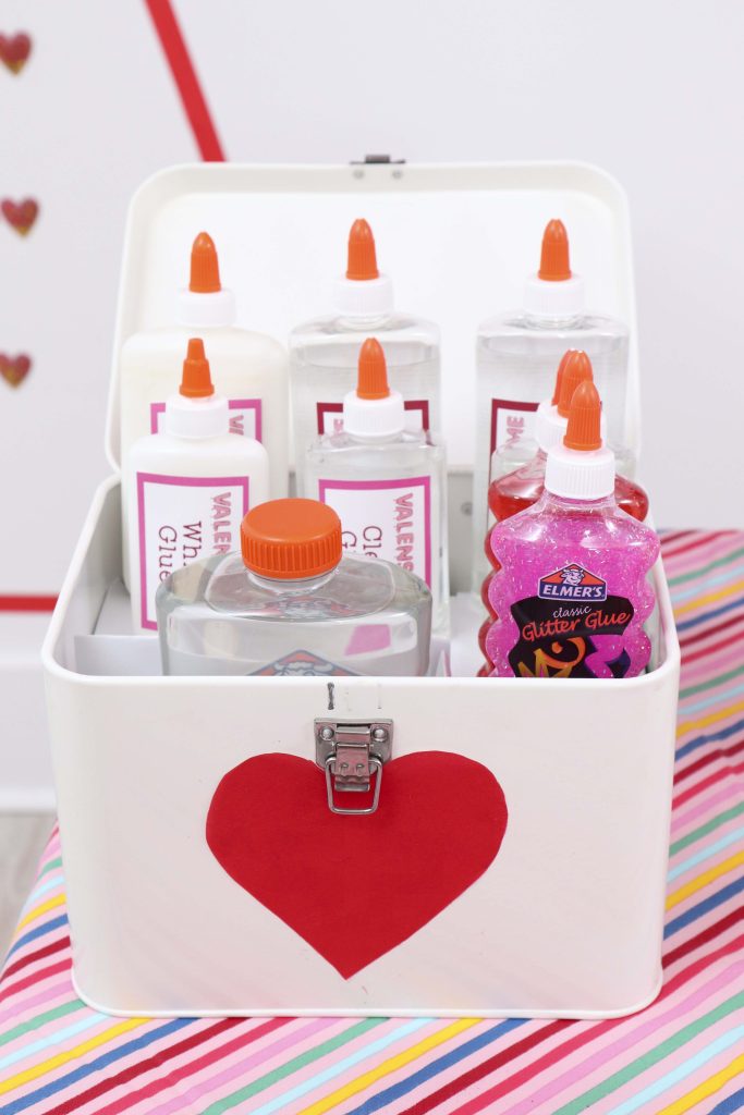 Set up a heart-filled Slime Lab for a fun and entertaining Valentine's Day Slime Party for Kids! Plus, how to create to-go Slime Kits for friends! Get details now at fernandmaple.com!