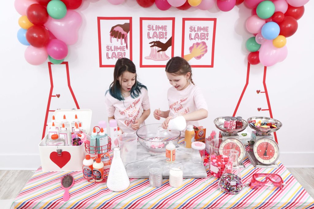 Set up a heart-filled Slime Lab for a fun and entertaining Valentine's Day Slime Party for Kids! Plus, how to create to-go Slime Kits for friends! Get details now at fernandmaple.com!