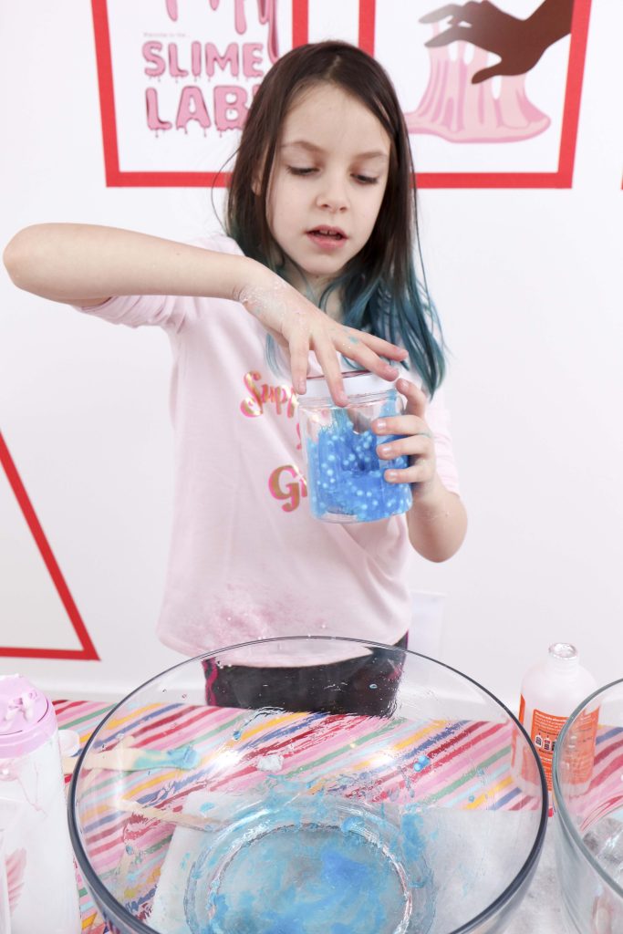 Set up a heart-filled Slime Lab for a fun and entertaining Valentine's Day Slime Party for Kids! Plus, how to create to-go Slime Kits for friends! Get details now at fernandmaple.com!