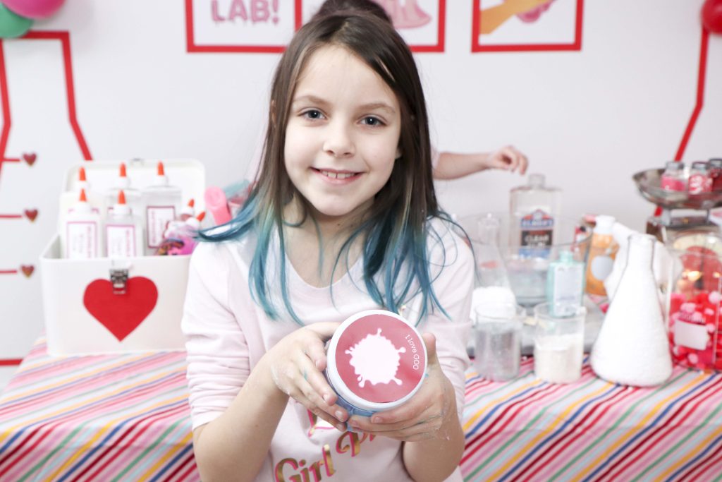 Set up a heart-filled Slime Lab for a fun and entertaining Valentine's Day Slime Party for Kids! Plus, how to create to-go Slime Kits for friends! Get details now at fernandmaple.com!