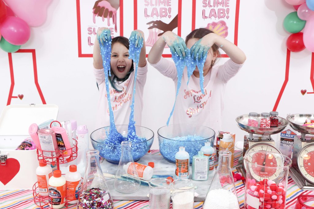 Set up a heart-filled Slime Lab for a fun and entertaining Valentine's Day Slime Party for Kids! Plus, how to create to-go Slime Kits for friends! Get details now at fernandmaple.com!