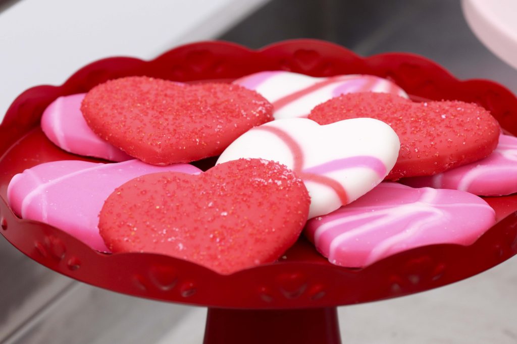 Valentine's Day Heart Cookies - Set up a heart-filled Slime Lab for a fun and entertaining Valentine's Day Slime Party for Kids! Plus, how to create to-go Slime Kits for friends! Get details now at fernandmaple.com!