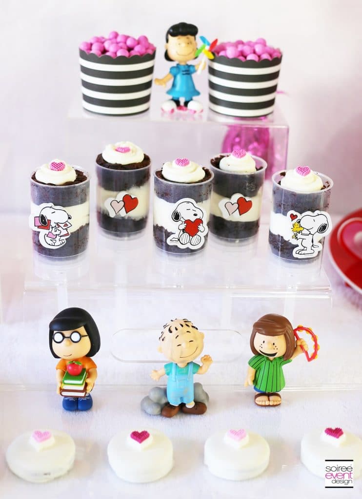 Peanuts Themed Valentine's Day Party - These fun 15 Valentine's Day Party Ideas for Kids and Teens feature tons of interactive activities, decor inspiration, and DIY dessert recipes! See them all now at fernandmaple.com!