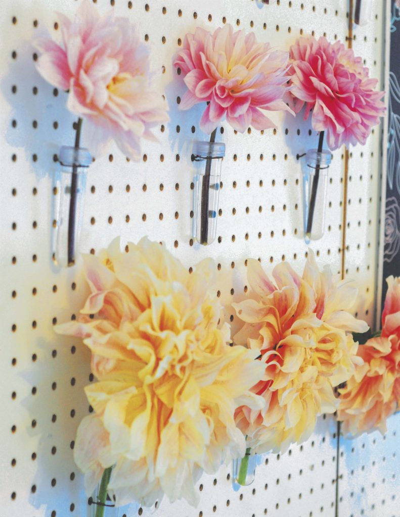 Floral Pegboard Backdrop for a floral arranging party - get details now at fernandmaple.com!