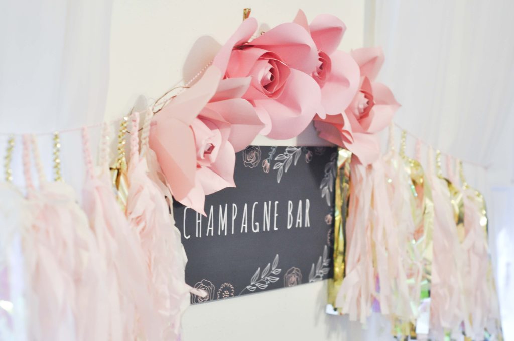 Paper Flower and Tassel Garland for a Floral Arranging Party - get details at fernandmaple.com!