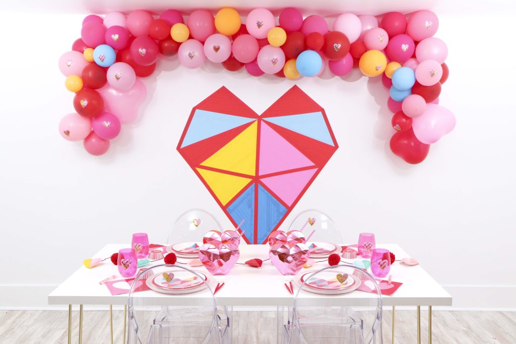 Geometric Heart Party - These fun 15 Valentine's Day Party Ideas for Kids and Teens feature tons of interactive activities, decor inspiration, and DIY dessert recipes! See them all now at fernandmaple.com!