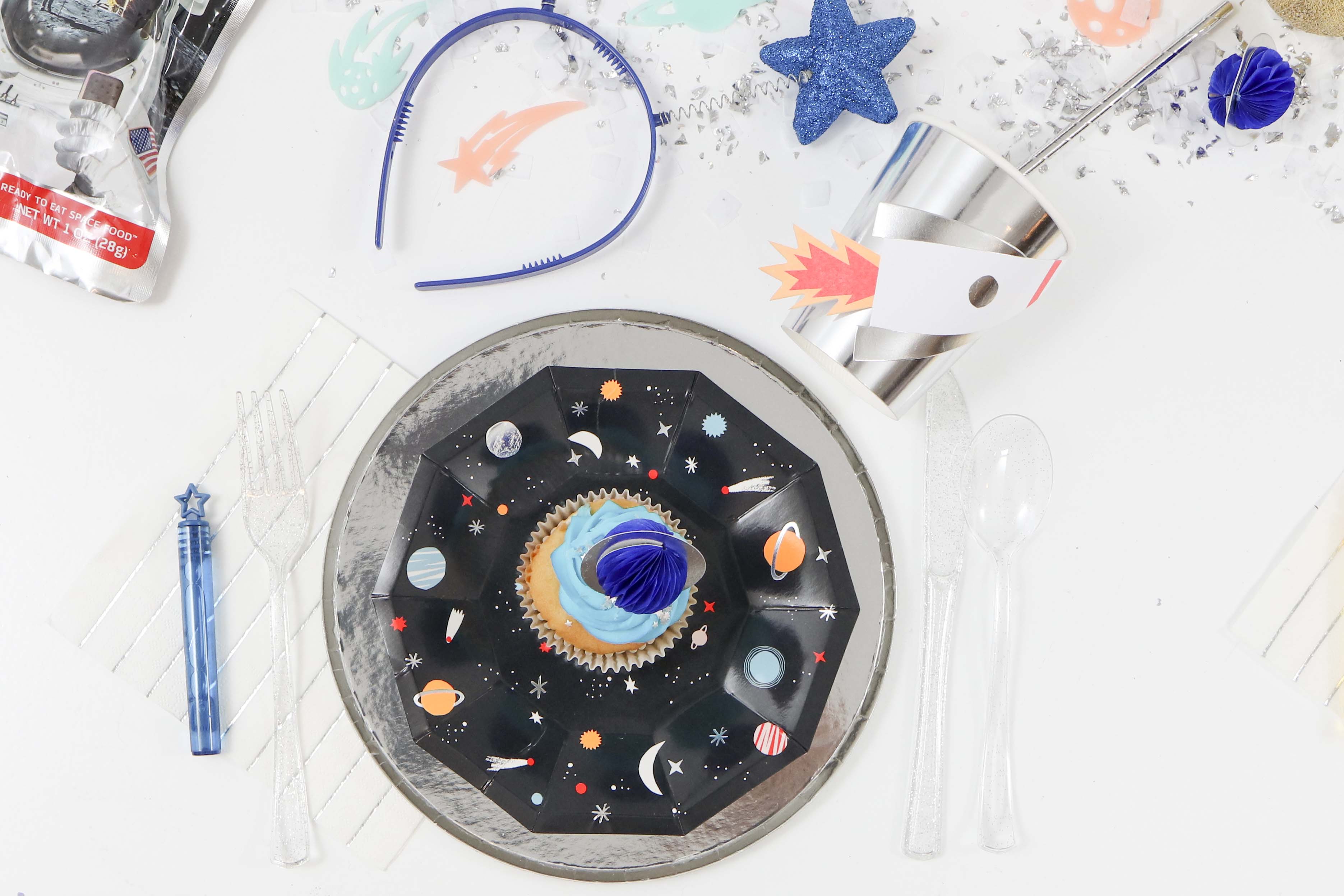 Space Party Place Settings - Looking to throw a Space or Rocket themed birthday? Check out this game-changing “party in a box” recommendation as well as tips for personalizing the party! Get details now at fernandmaple.com.