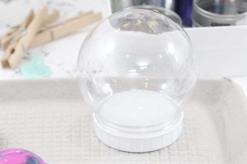 DIY Celestial Snow Globes - get more space-themed craft ideas now at fernandmaple.com!