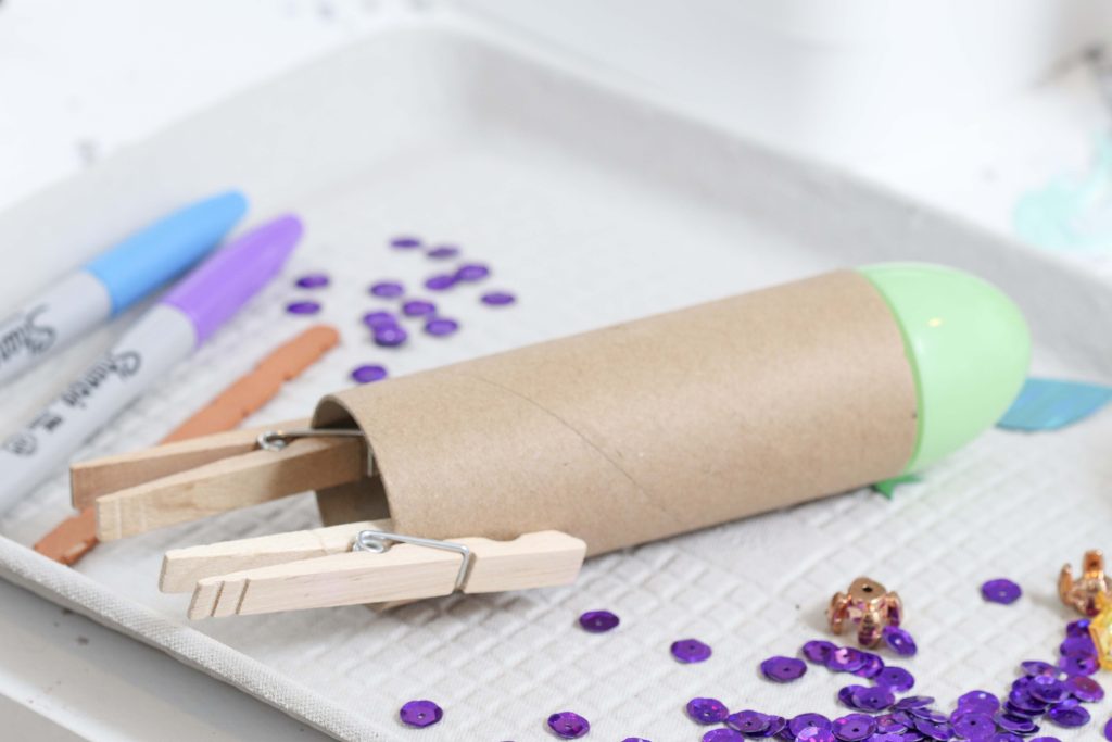 DIY Craft Roll Rockets - get more space-themed craft ideas now at fernandmaple.com!