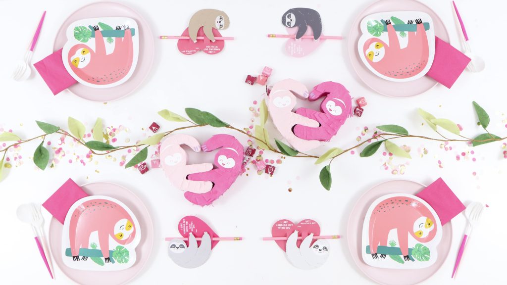 Table Setting for a Pink Sloth Party for Kids - get details now at fernandmaple.com!
