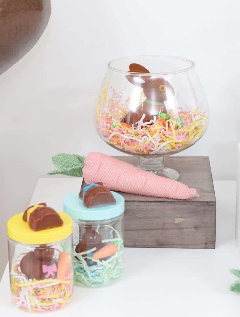 Chocolate Bunny Easter Party decor in glass containers and DIY treat jar favors- get more Chocolate Bunny Easter Party inspiration now at fernandmaple.com!