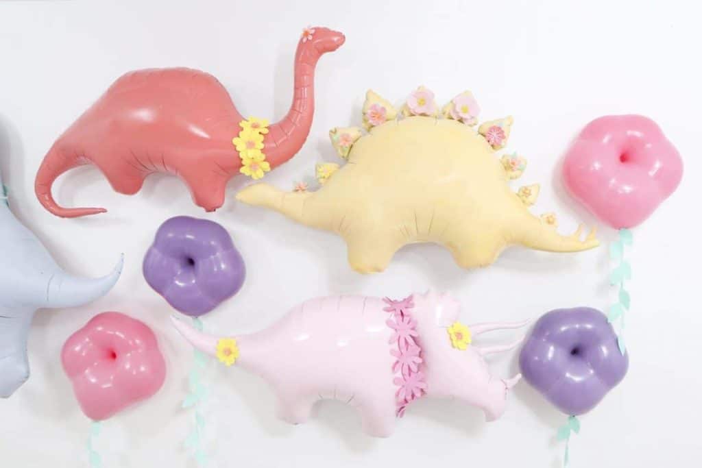 DIY Pastel Spring Dinosaur and Floral Backdrop - get more Spring Dinosaur Party inspiration at fernandmaple.com!