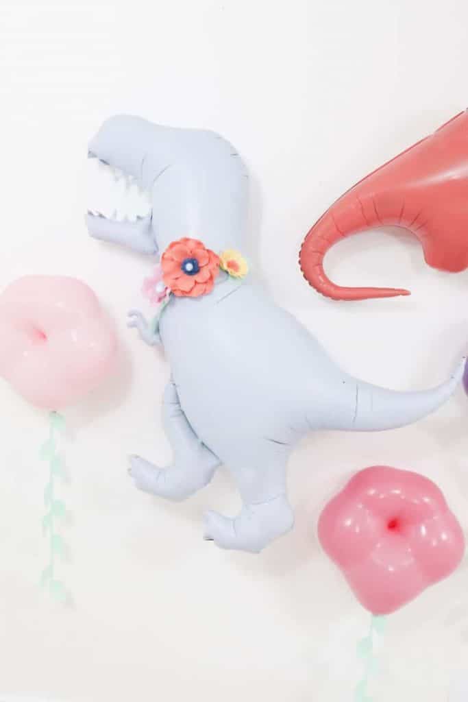 DIY Pastel Spring Dinosaur and Floral Backdrop - get more Spring Dinosaur Party inspiration at fernandmaple.com!