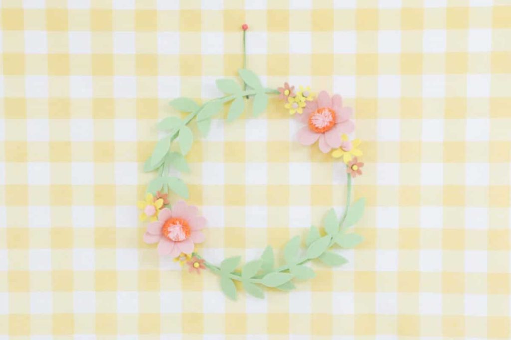 Felt floral wreath on yellow gingham backdrop - get more Spring Party inspiration now at fernandmaple.com!