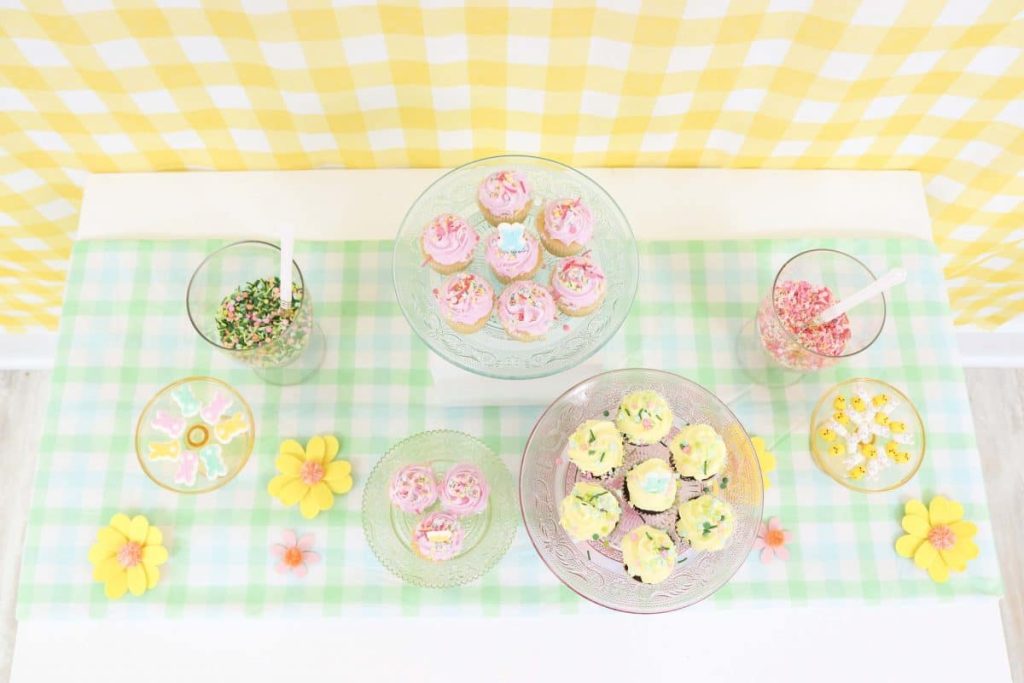 Spring dessert table using yellow and green gingham tablecloths - get more Spring party inspiration now at fernandmaple.com!