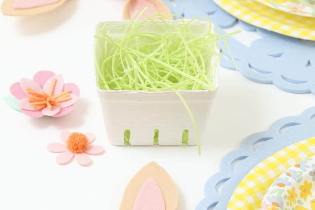 Edible grass in berry baskets for a Spring Gingerbread House decorating party - get more Spring Party inspiration now at fernandmaple.com!