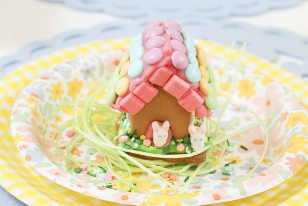 Decorated house from a Spring Gingerbread House decorating party - get more Spring Party inspiration now at fernandmaple.com!