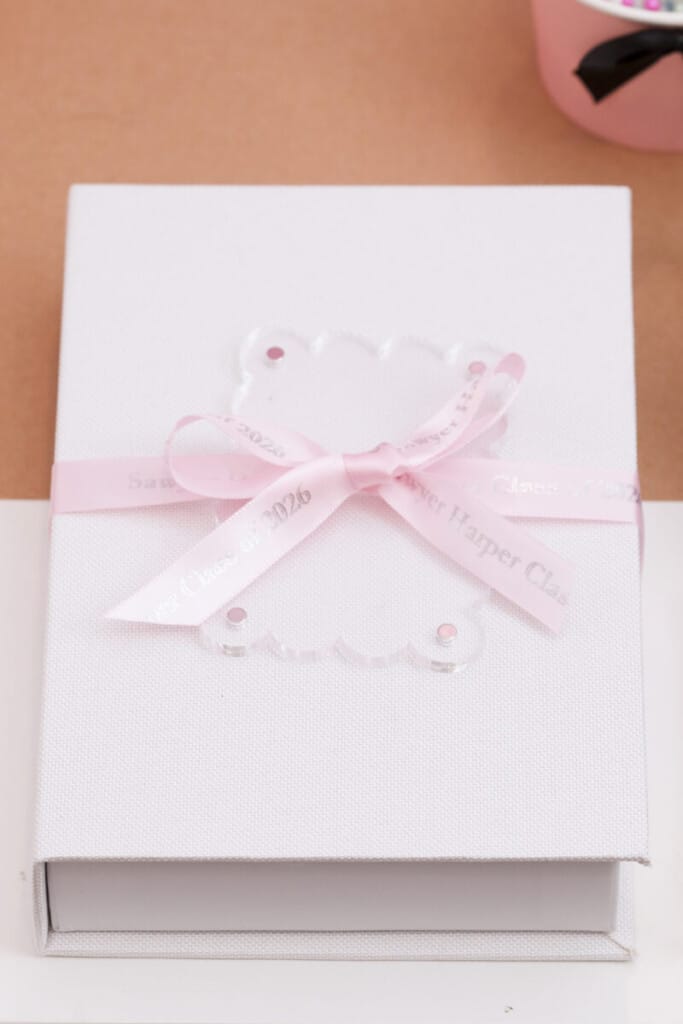 book-themed senior year memory box wrapped with personalized graduation ribbon