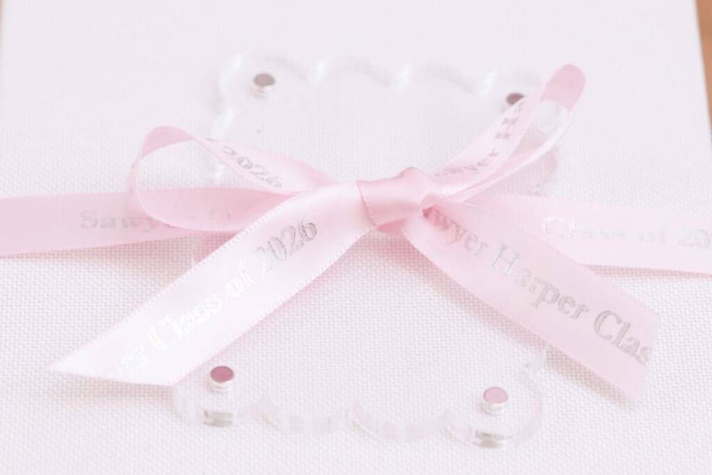 personalized graduation ribbon on book-themed memory box from Oriental Trading