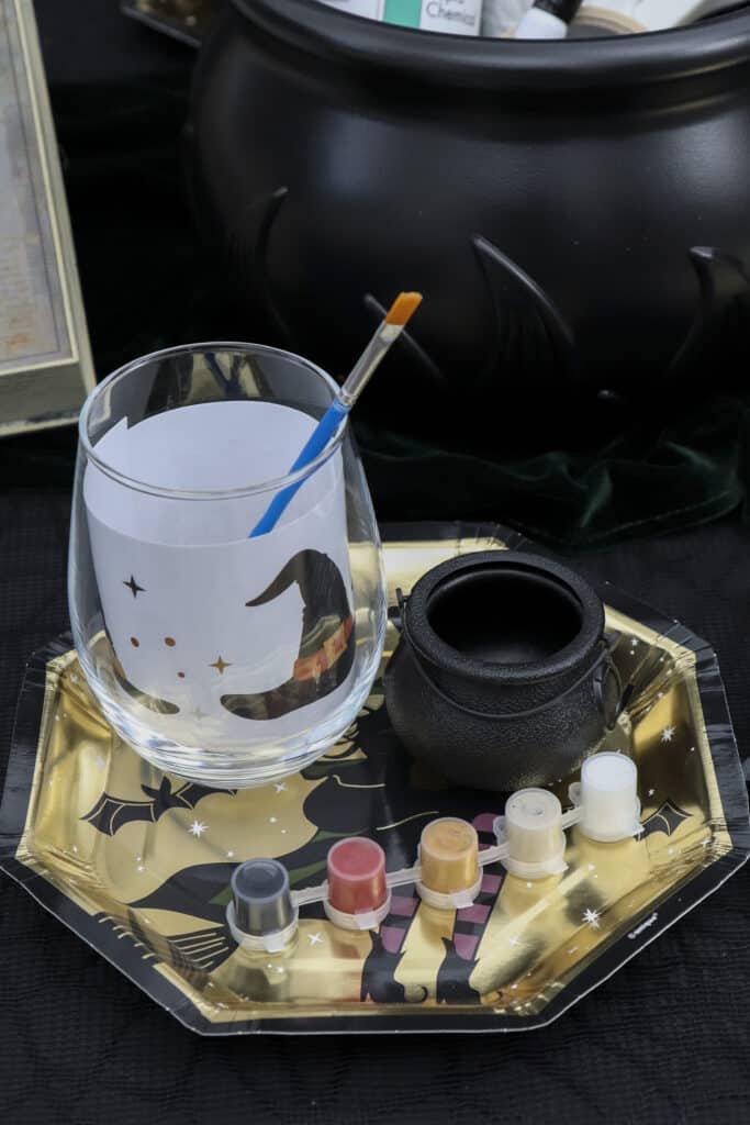 Gothic paint and sip party supplies including wine glasses, glass paint and templates
