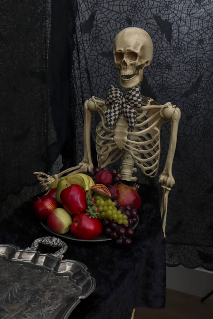 Gothic paint and sip party food service on ornate trays - place ontop of coffin held by skeletons