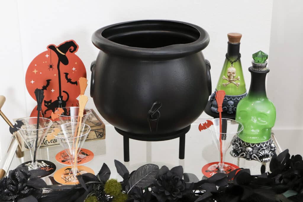 witch potion bar as a cocktail bar with cauldron drink dispenser