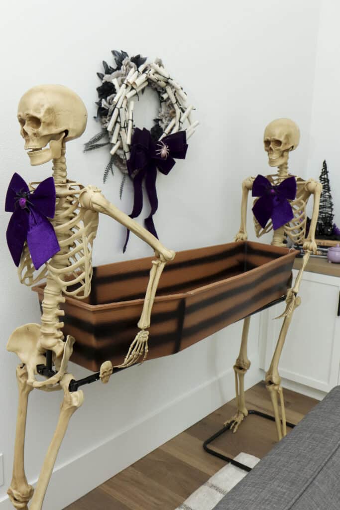 Dark Romantasy gothic bar - skeletons carrying a coffin cooler