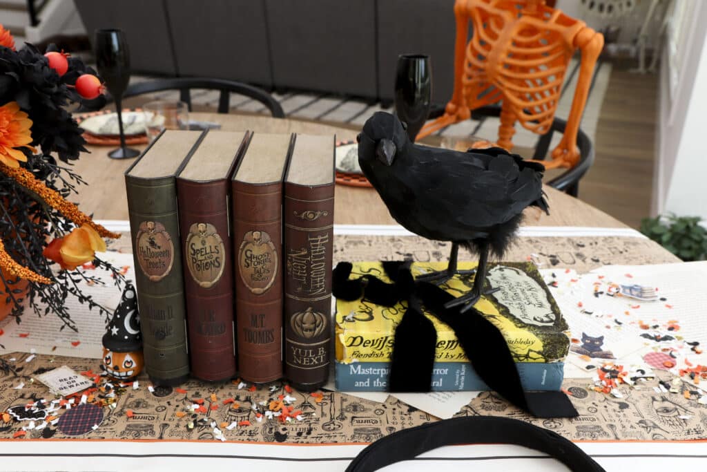 Spooky book club dining table book and crow centerpiece