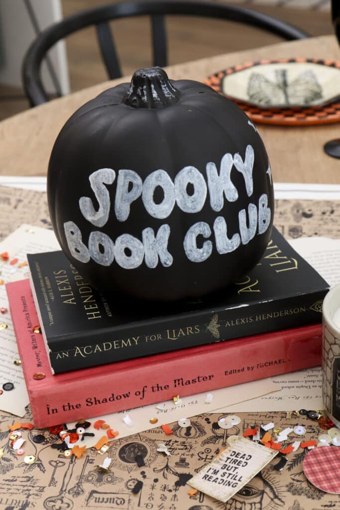 Spooky book club dining table DIY Pumpkin & book centerpiece